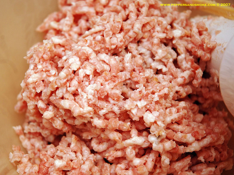 A pile of ground bacon ready to be formed into patties