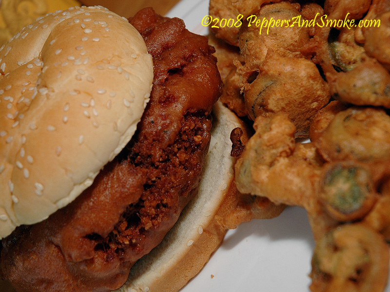 The finished deep fried bacon burger cut open